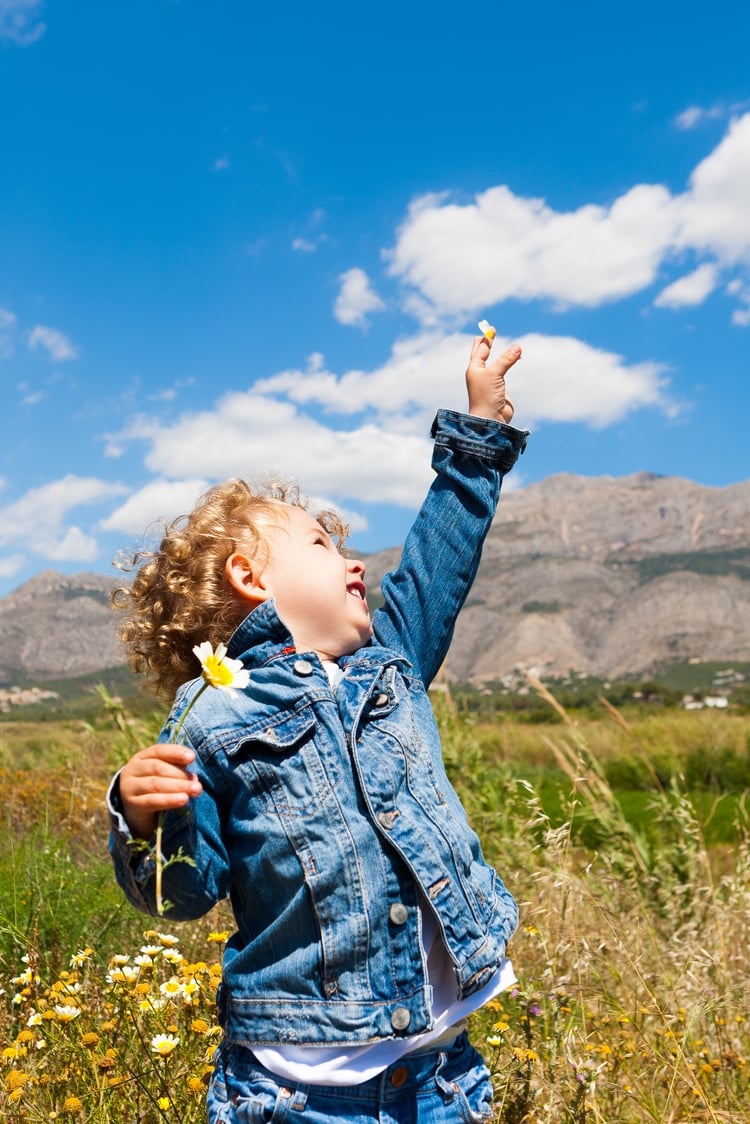 child with flower