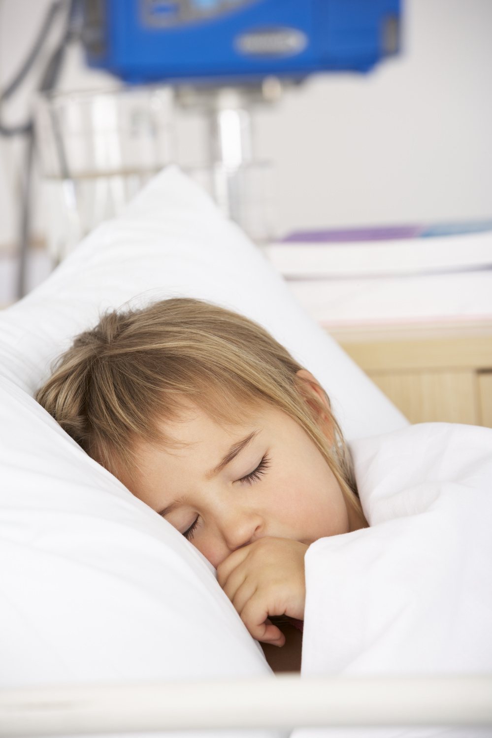 Young Girl Asleep in Accident and Emergency Bed